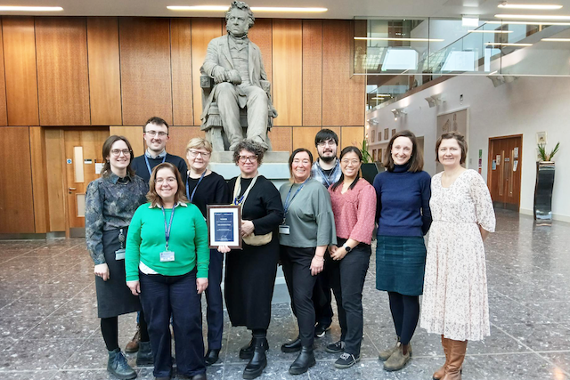 sebi livestock team holding the staff recognition award